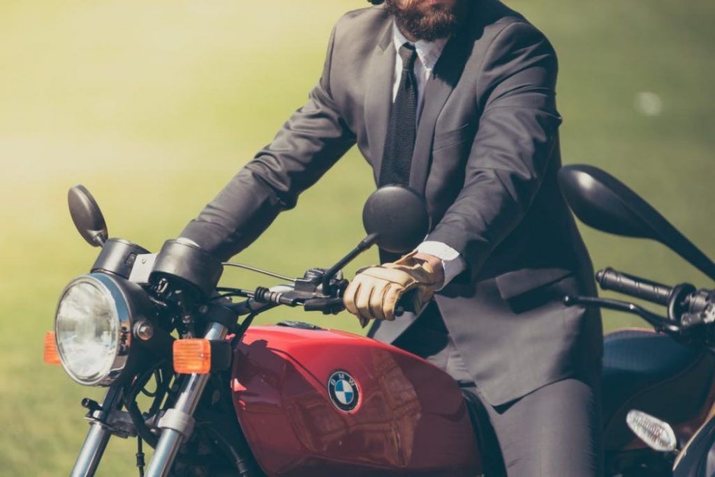 guy-suit-motorbike-1050x701